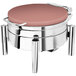 A copper coated stainless steel round chafer with a hinged dome cover on a pillar'd stand.