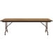 A Correll medium oak rectangular folding table with a metal frame.