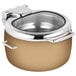 An Eastern Tabletop stainless steel soup marmite with a hinged glass lid and a brown copper coating.