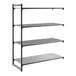 A black metal shelving unit with three vented shelves and one solid shelf.
