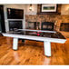 An Atomic black and white air hockey table.