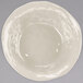 A GET New Yorker ivory melamine serving bowl on a gray surface.