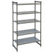 A grey metal Cambro Camshelving® Basics Plus stationary shelving unit with four shelves.