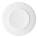 A white plate with a scalloped edge.