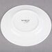 A Libbey Alpine White Porcelain Plate with black text on a white background.