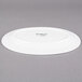 A white Libbey porcelain platter with black text reading "Empire" on a gray surface.