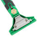 A green and black Unger ErgoTec SwivelLoc squeegee handle.