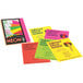 A close-up of neon colored paper.