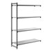 A black metal shelving unit with four solid shelves designed for storage.