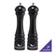 A black Chef Specialties pepper mill and salt mill set with silver tops.