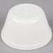 A white polycarbonate Carlisle bouillon cup.