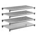 A set of four Cambro shelving units, including three vented shelves and one solid shelf, designed for storage organization.