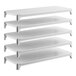 A set of five solid white shelving units designed for storage and organization.
