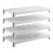 A set of four solid white shelving units designed for storage and organization.