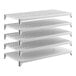 A set of five white shelving units, including one solid shelf and four vented shelves, designed for modular storage.
