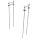 A pair of metal poles with a metal bar on top.