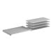 A stack of white metal shelves with vented surfaces.