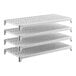 A set of four vented plastic shelving units designed for modular storage.