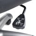 A close-up of a black OIF executive chair with white text.