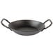 A black Lodge carbon steel frying pan with double loop handles.