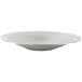 An American Metalcraft stainless steel oval bowl with a hammered design and silver rim.