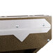 A close-up of a brown metal Curtron insect trap box with a silver strip on white paper.