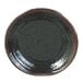 A black melamine plate with a brown rim.