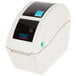 A white Cardinal Detecto thermal label printer.