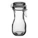 An Acopa clear glass carafe with a metal lid.