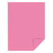 A pink paper with a curled corner.