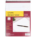 A close-up of a TOPS Docket Gold wirebound planner pad with pen and paper on it.