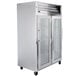 A Traulsen stainless steel 2-section glass door refrigerator.