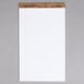 A white lined paper pad with a perforated edge.