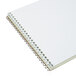 An Ampad Gregg ruled steno pad with a spiral bound white cover.