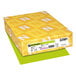 A yellow box of Astrobrights Terra Green color paper with white and yellow labels.