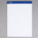 An Ampad wide ruled white writing pad with blue lines.