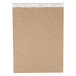 A close-up of a TOPS Second Nature wide ruled legal pad with white paper and brown tape.