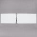 A white paper with a silver ring binder.