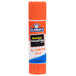 An orange Elmer's clear glue stick with a label.