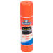 An orange Elmer's Clear School glue stick with a label.