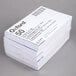 A stack of white Oxford index cards.