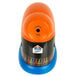 An orange and blue Elmer's CrayonPro electric crayon sharpener.