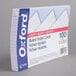 A stack of Oxford white ruled index cards.