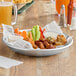 An aluminum tray of food on a table.