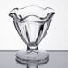 A clear Libbey tulip sundae glass with a wavy edge.