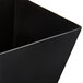 A black square Fineline Tiny Barware cube bowl.