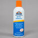 An orange and white Elmer's spray bottle of clear adhesive.