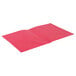 A red folded paper with embossed details.