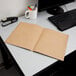 An Oxford Earthwise recycled brown paper folder on a desk.