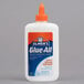 A white Elmer's Glue-All bottle with an orange cap.